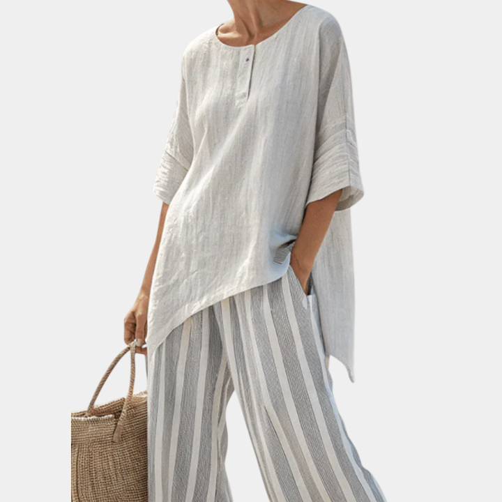 Fiorella | Blouse asymétrique élégante et pantalons rayés