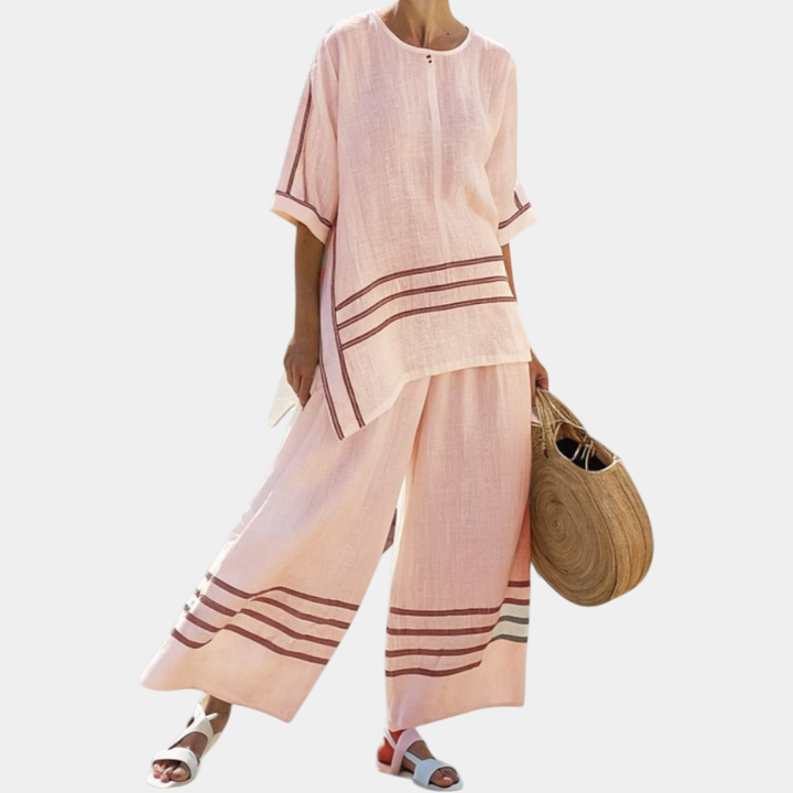 Vittorina | Haut asymétrique à rayures sophistiqué et pantalons audacieux