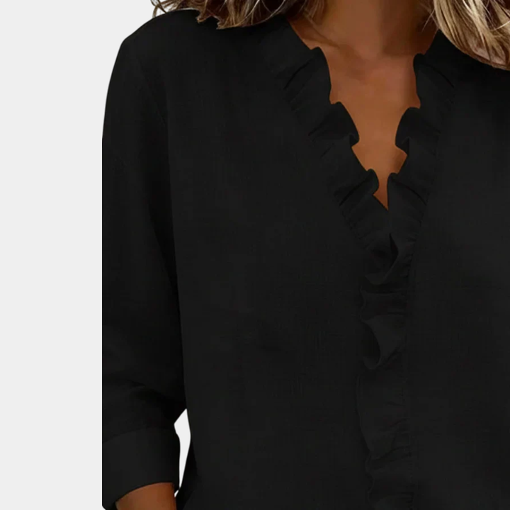 Flavie | Blouse avec décolleté en V et volants délicats