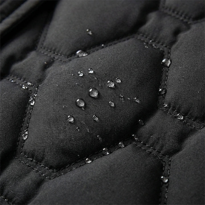 Briseida | Long manteau en duvet avec capuche